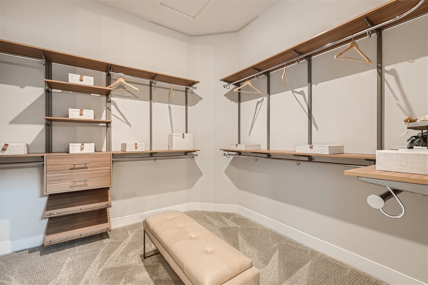 A modern bedroom with a large mirror.