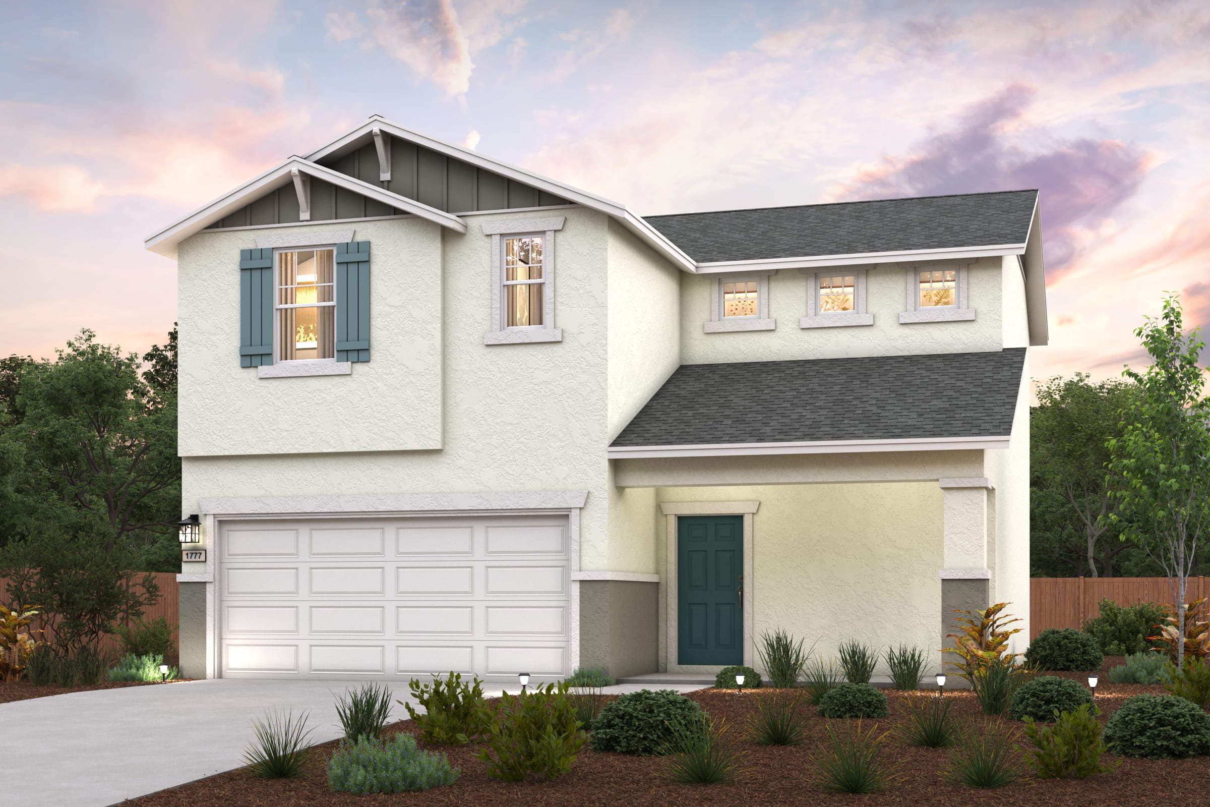 A white house with a garage.