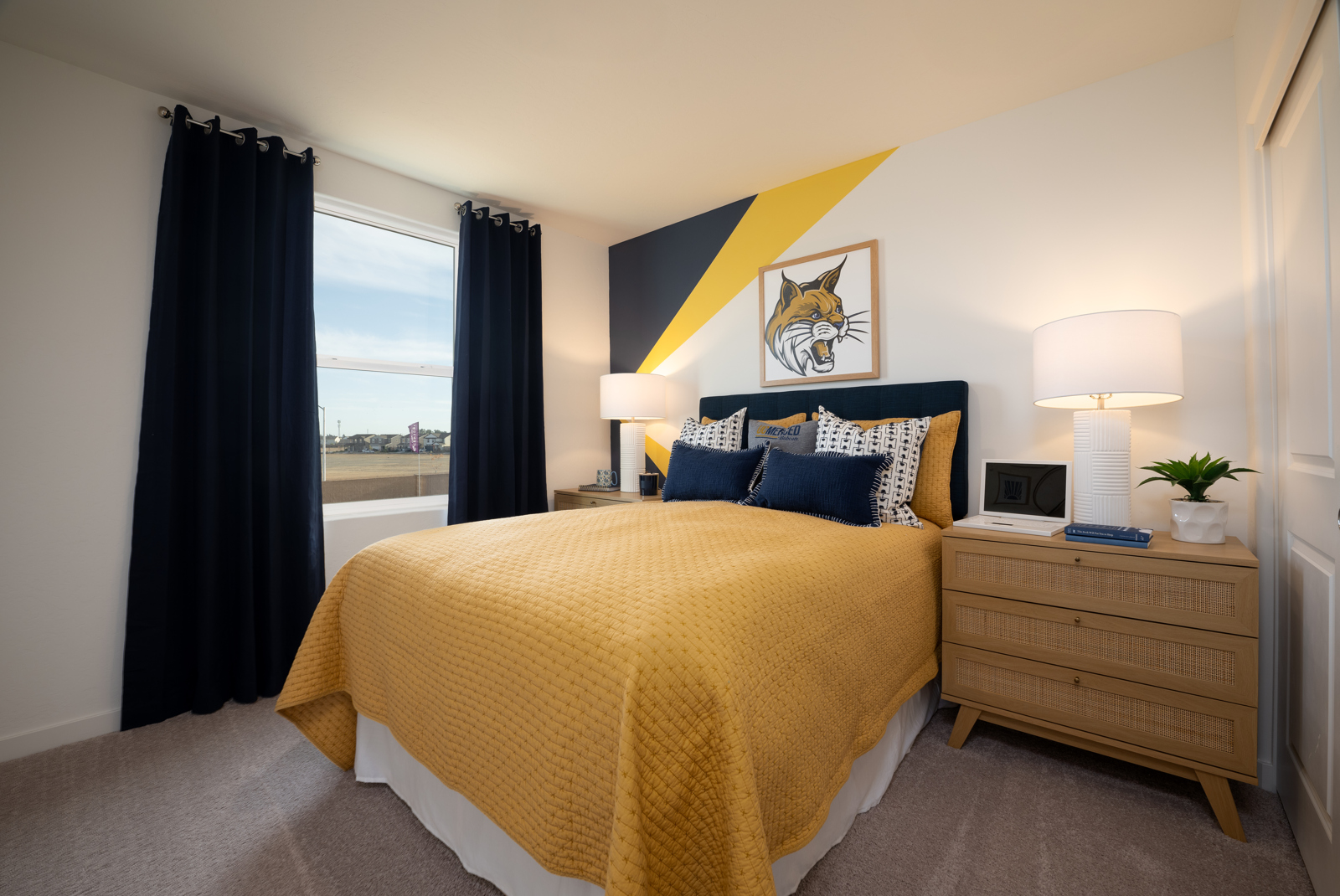 A bedroom with a large bed.