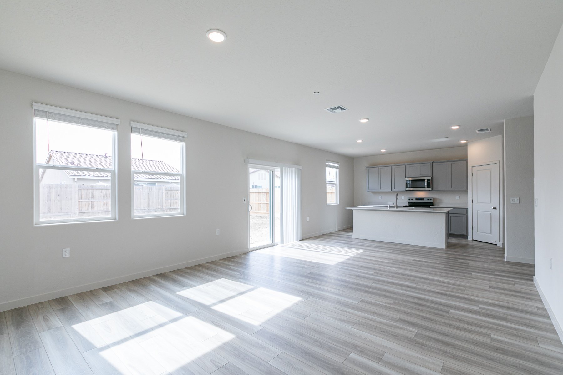 A large empty room with white walls.