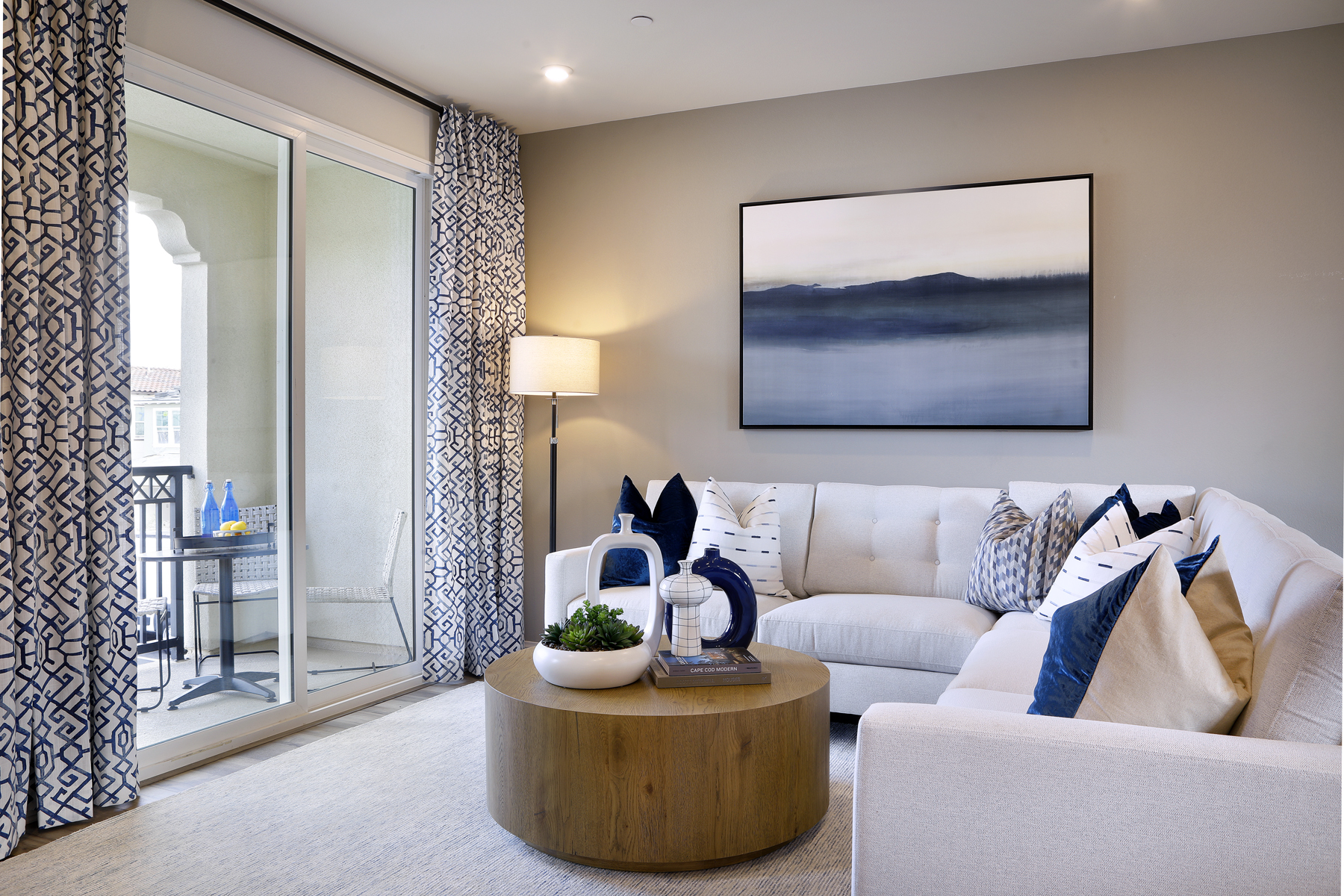 A living room with a couch and a coffee table.