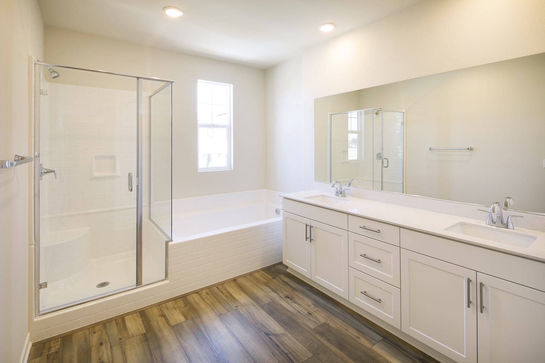 A bathroom with a glass shower.