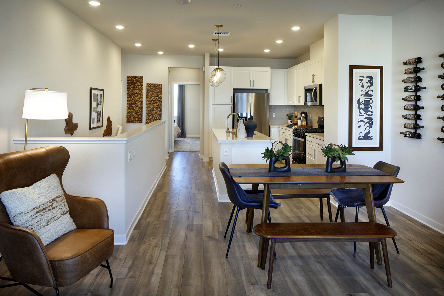 A living room with a dining table.