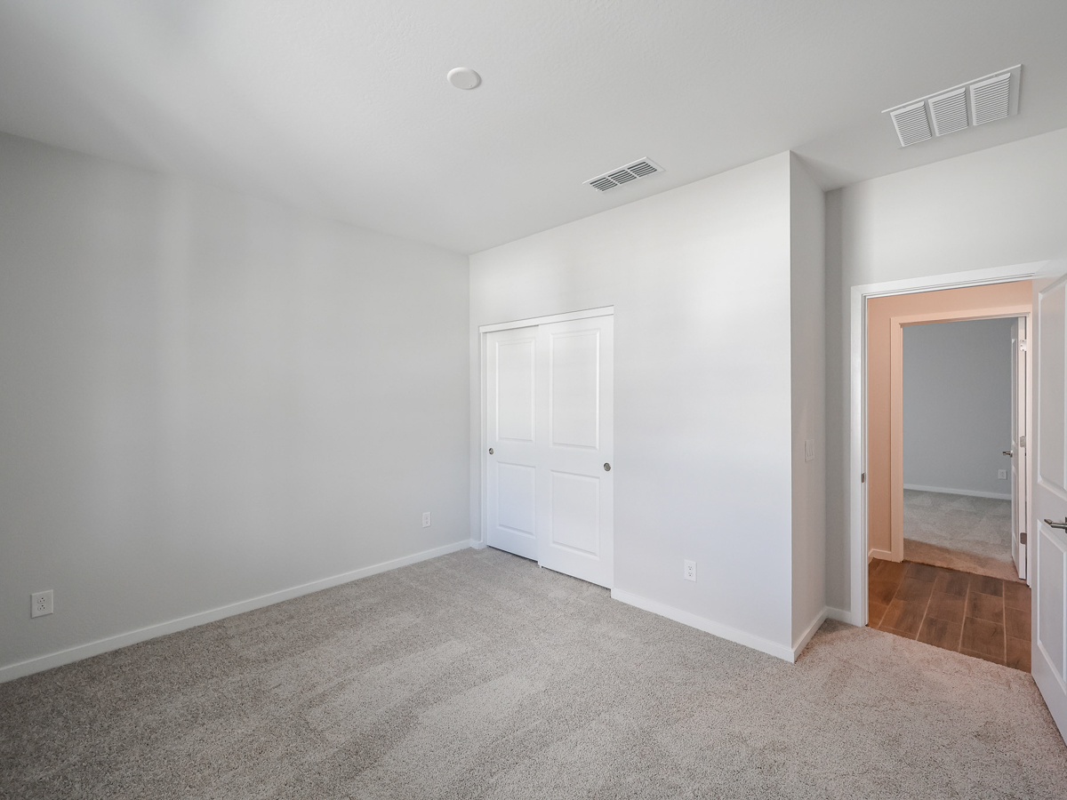 A room with white doors.