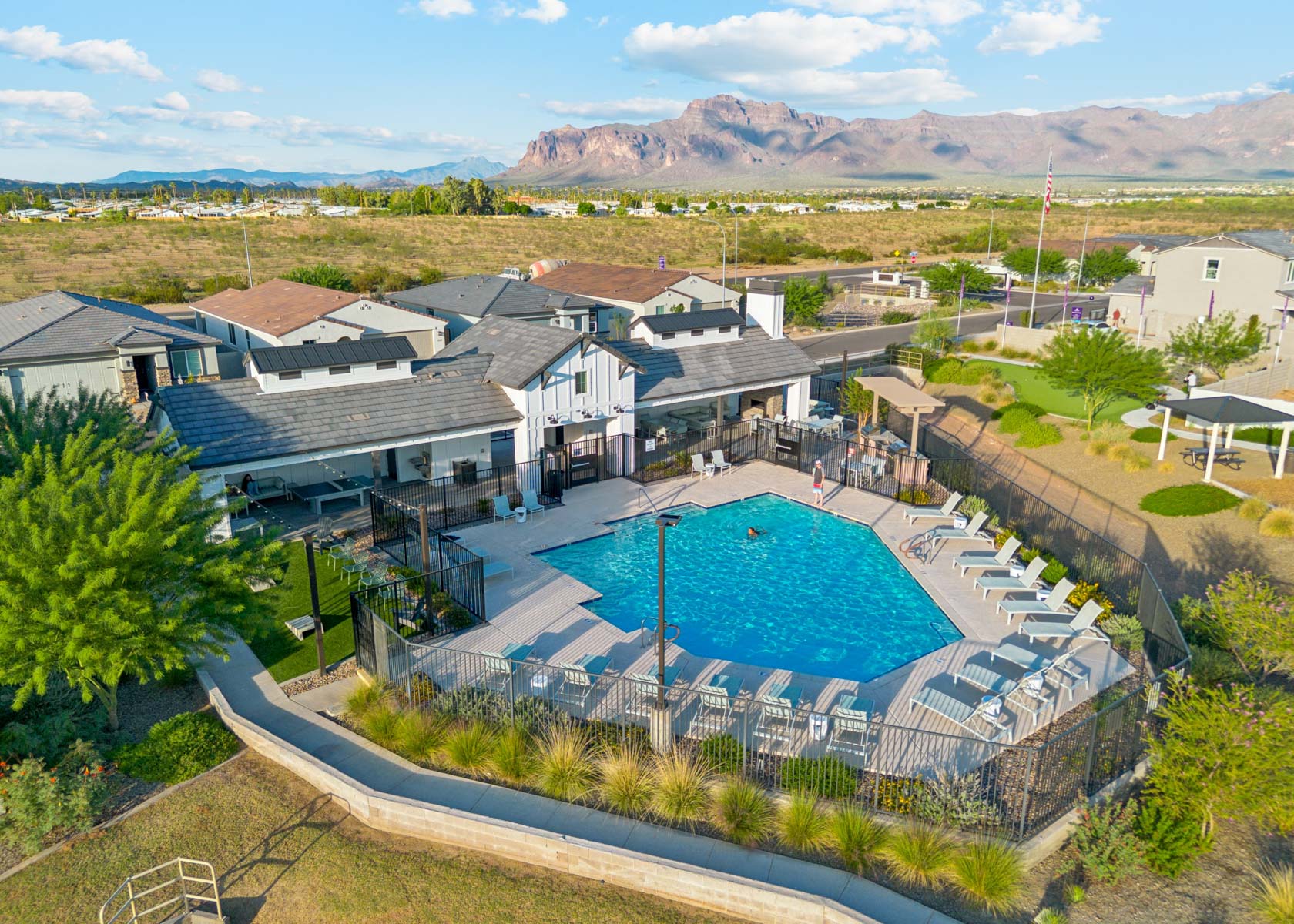 A swimming pool surrounded by buildings.