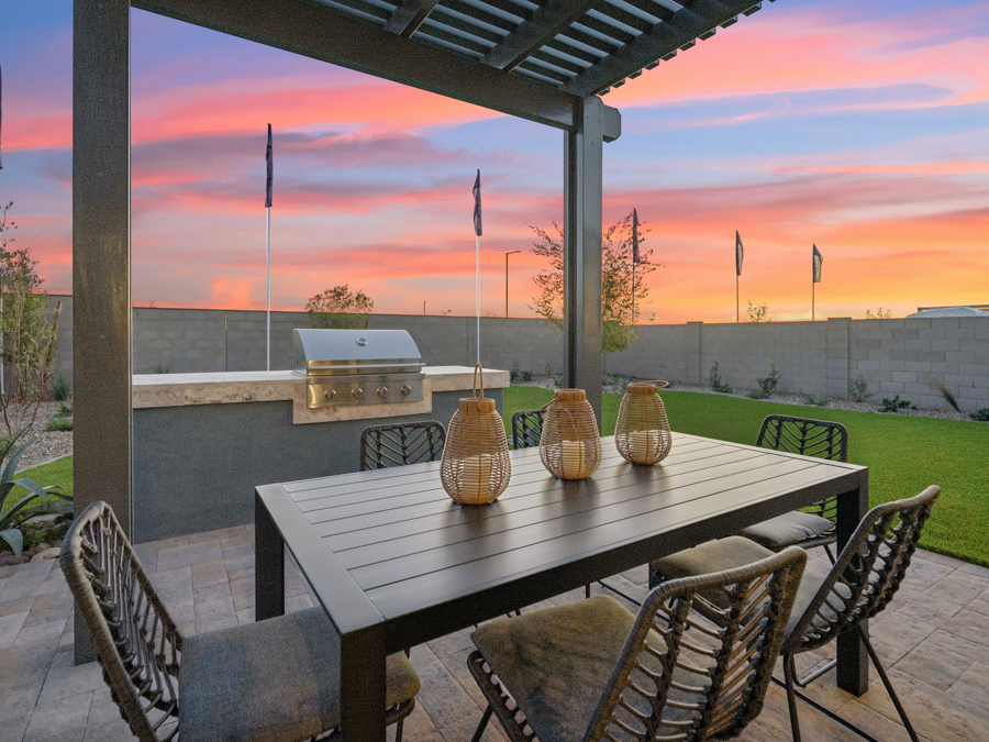 A table with chairs around it.