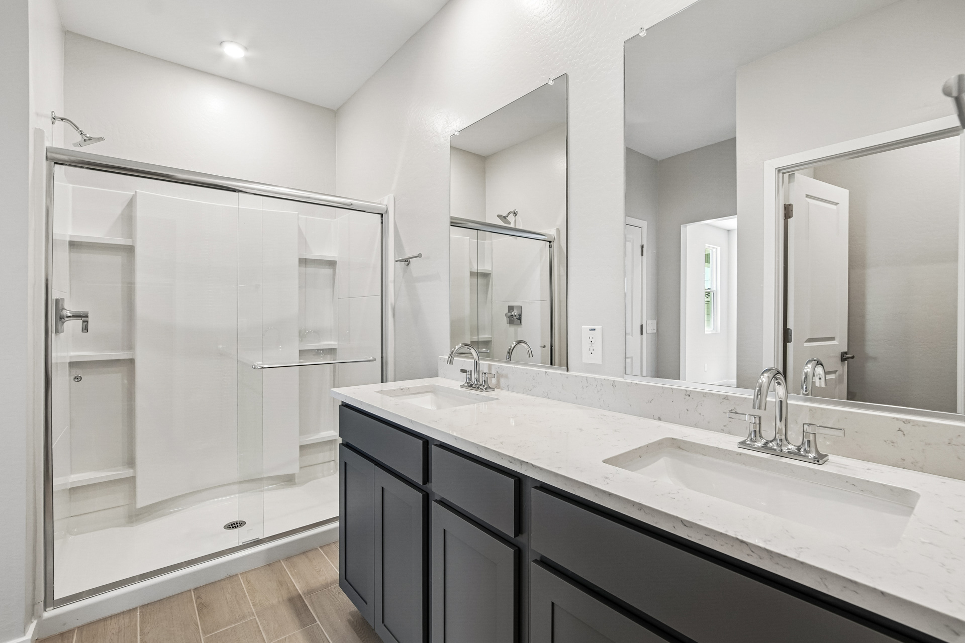 A bathroom with a glass shower.