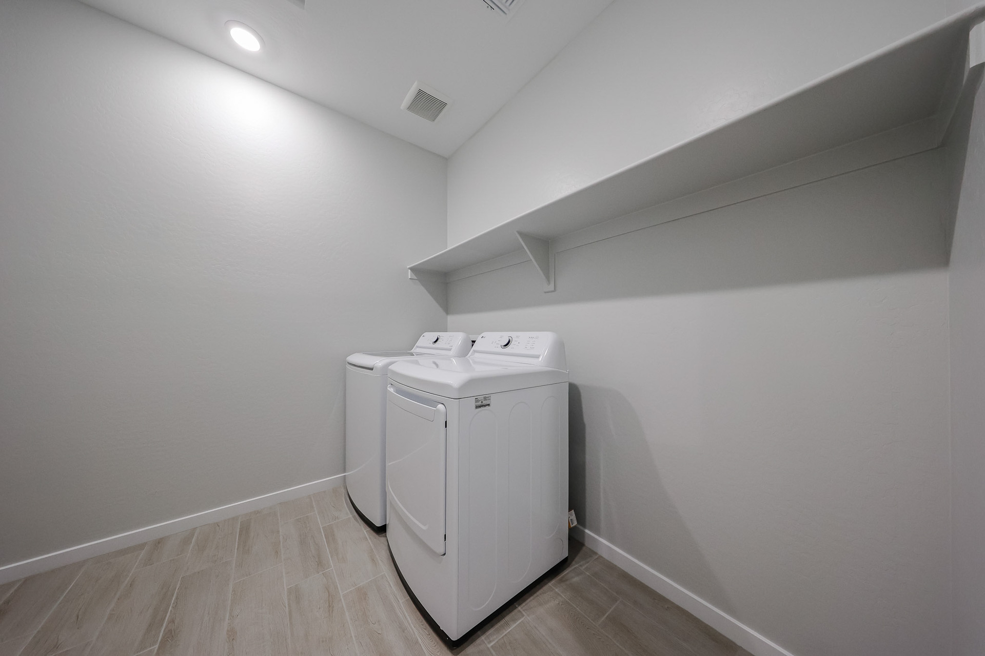 A white machine in a room.