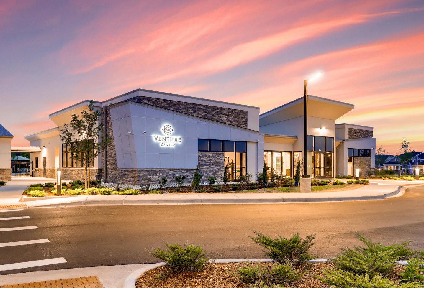 A building with a parking lot.