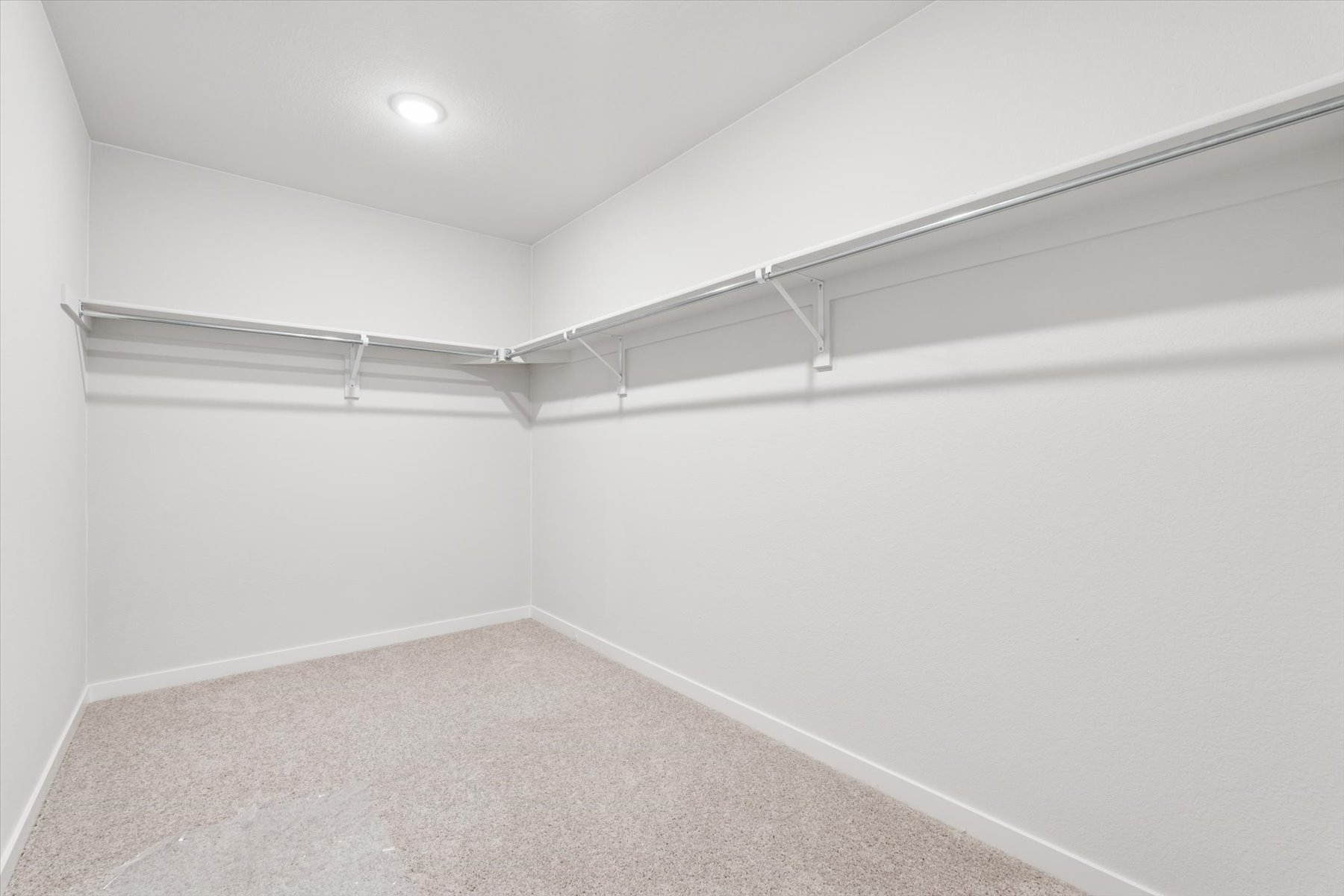 A white room with a white wall.