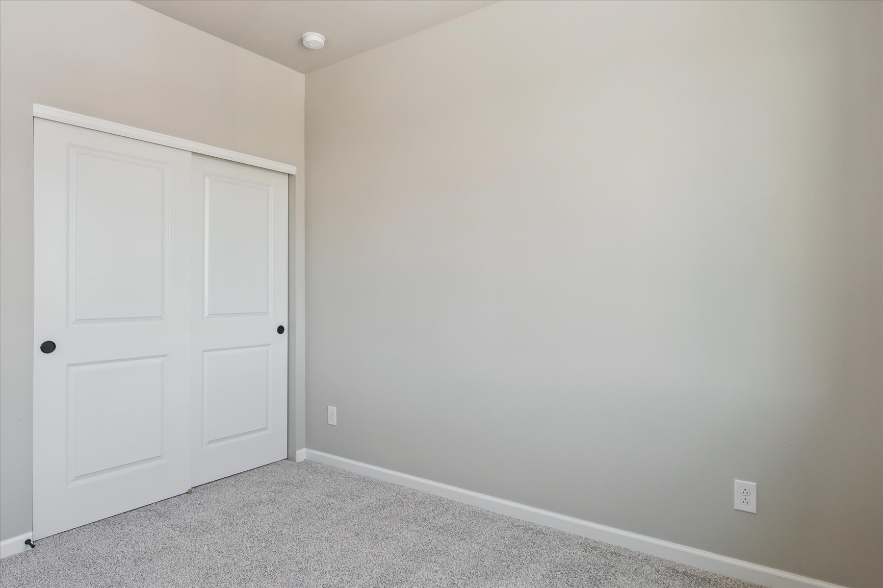 A white door in a room.
