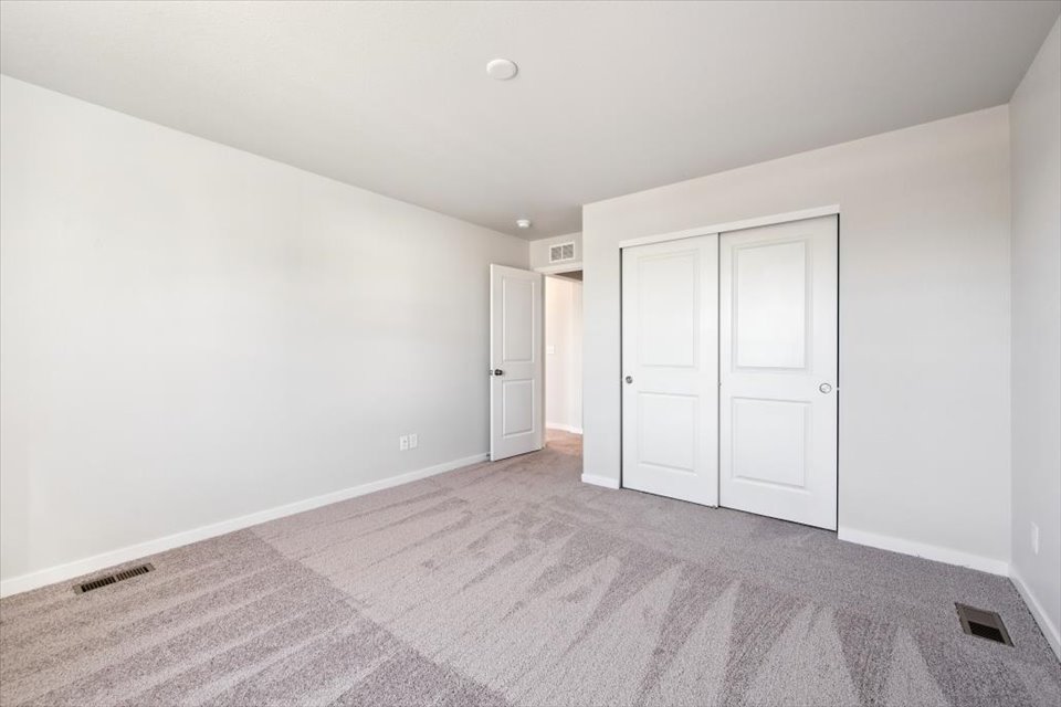 A room with white doors.