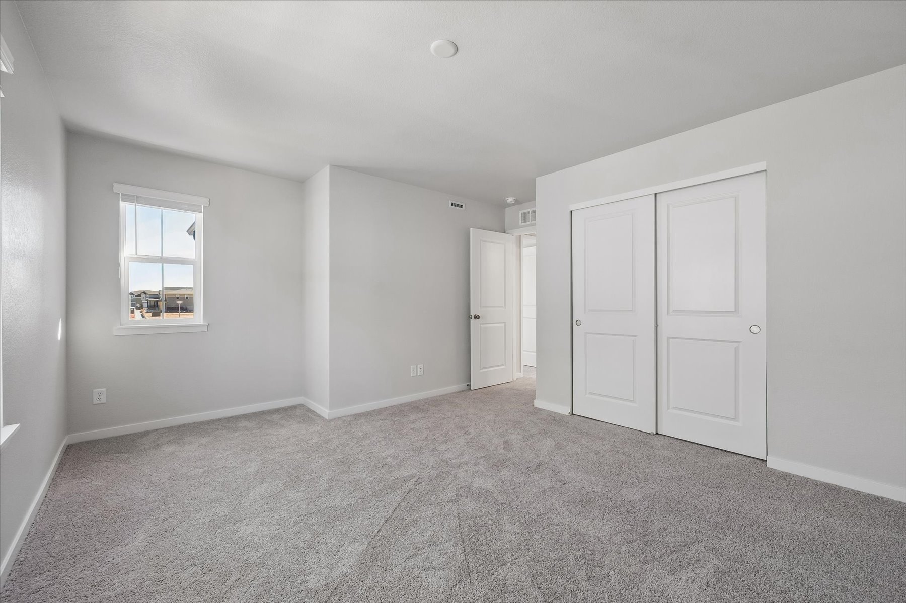 A room with white doors.