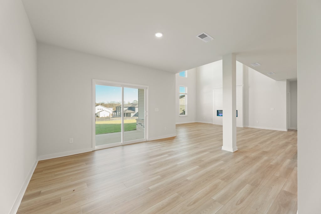 A room with a wood floor and a wood floor.
