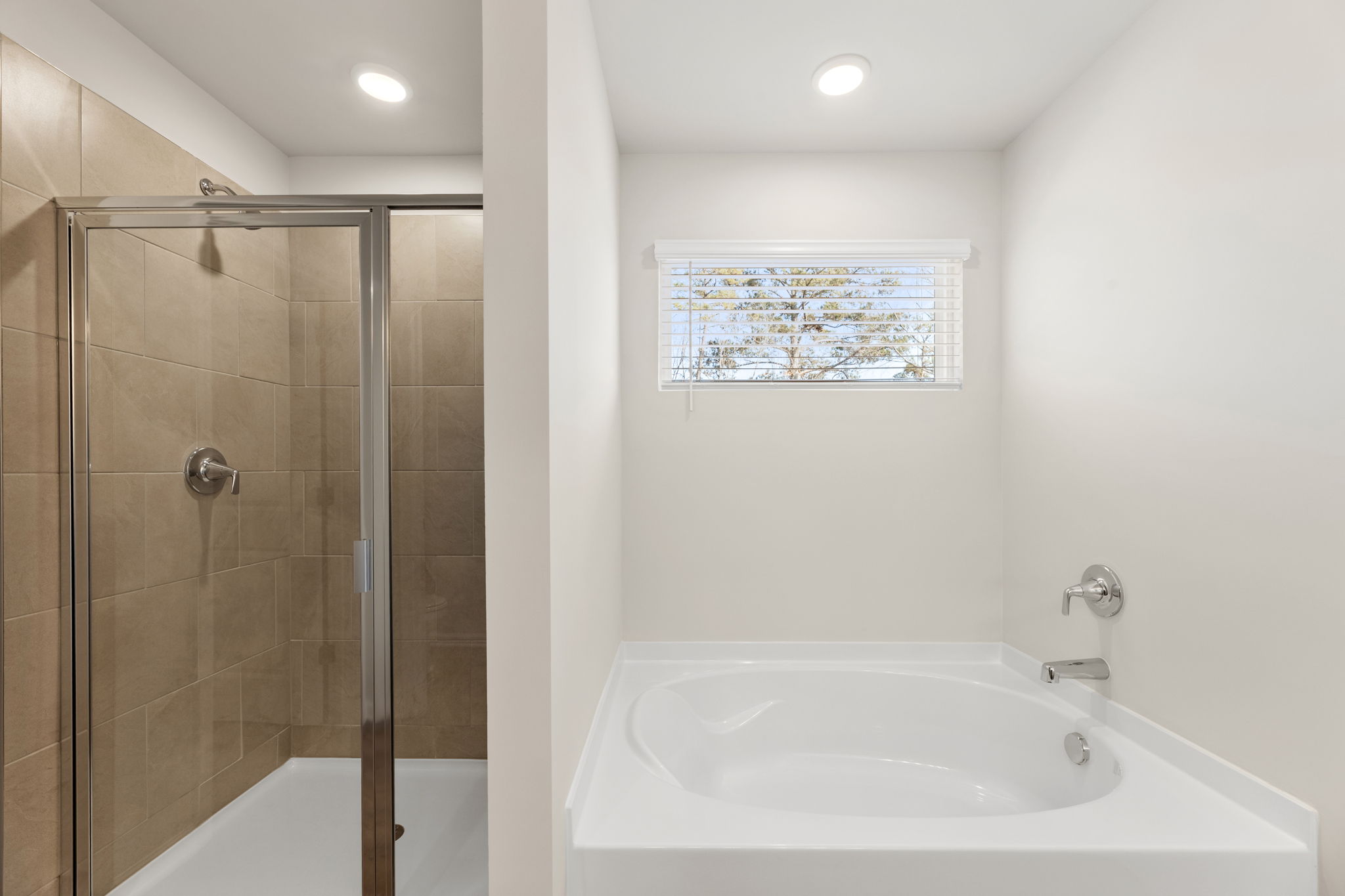 A bathroom with a glass shower.