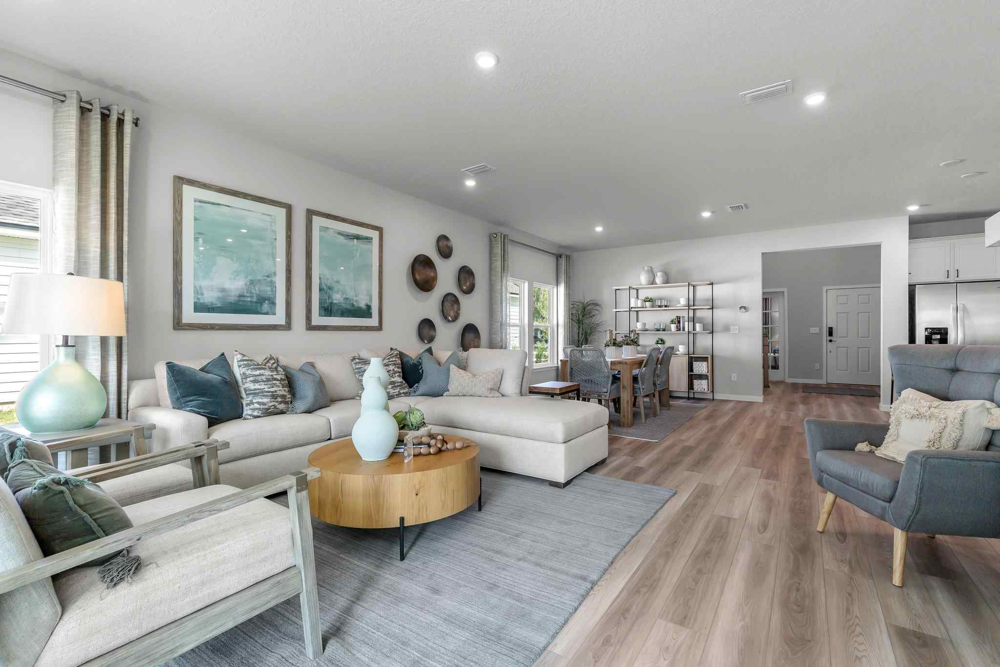 A living room with a couch and a table.