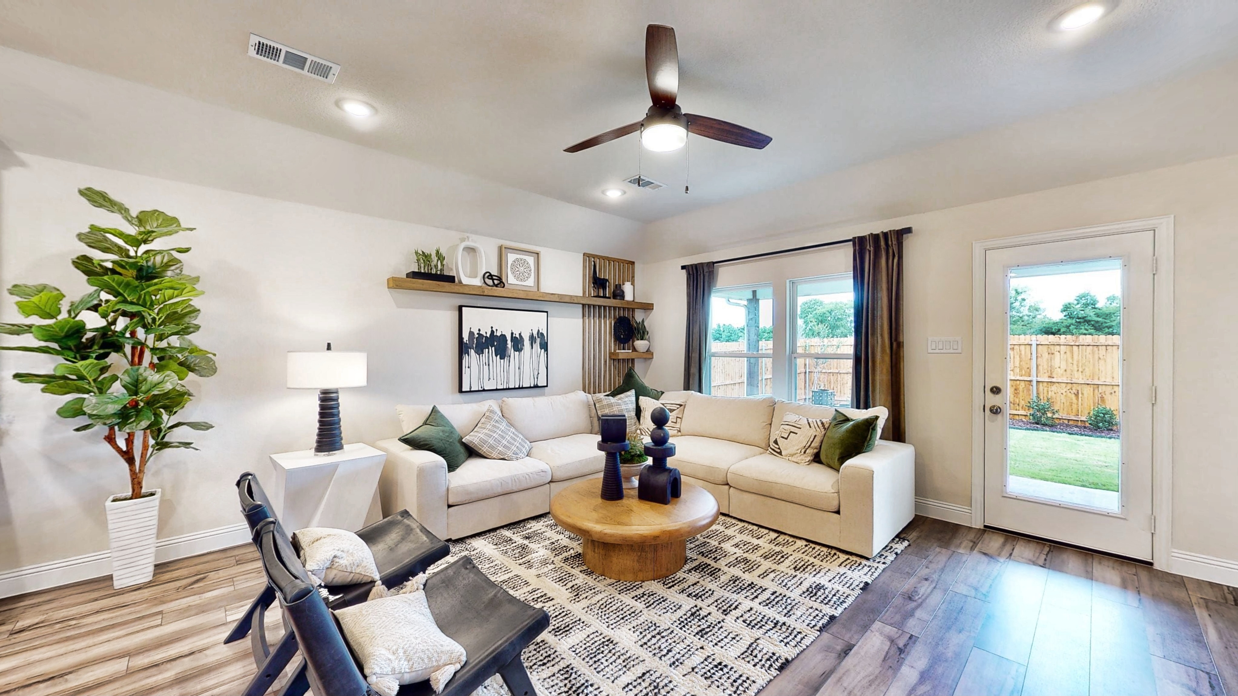 A living room with a large window.