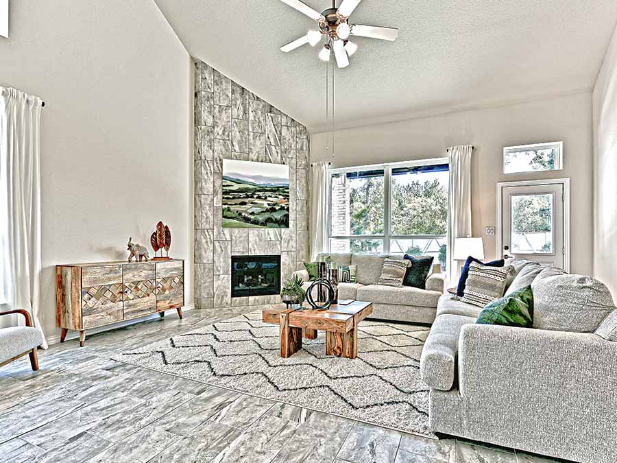 A living room with a fireplace.