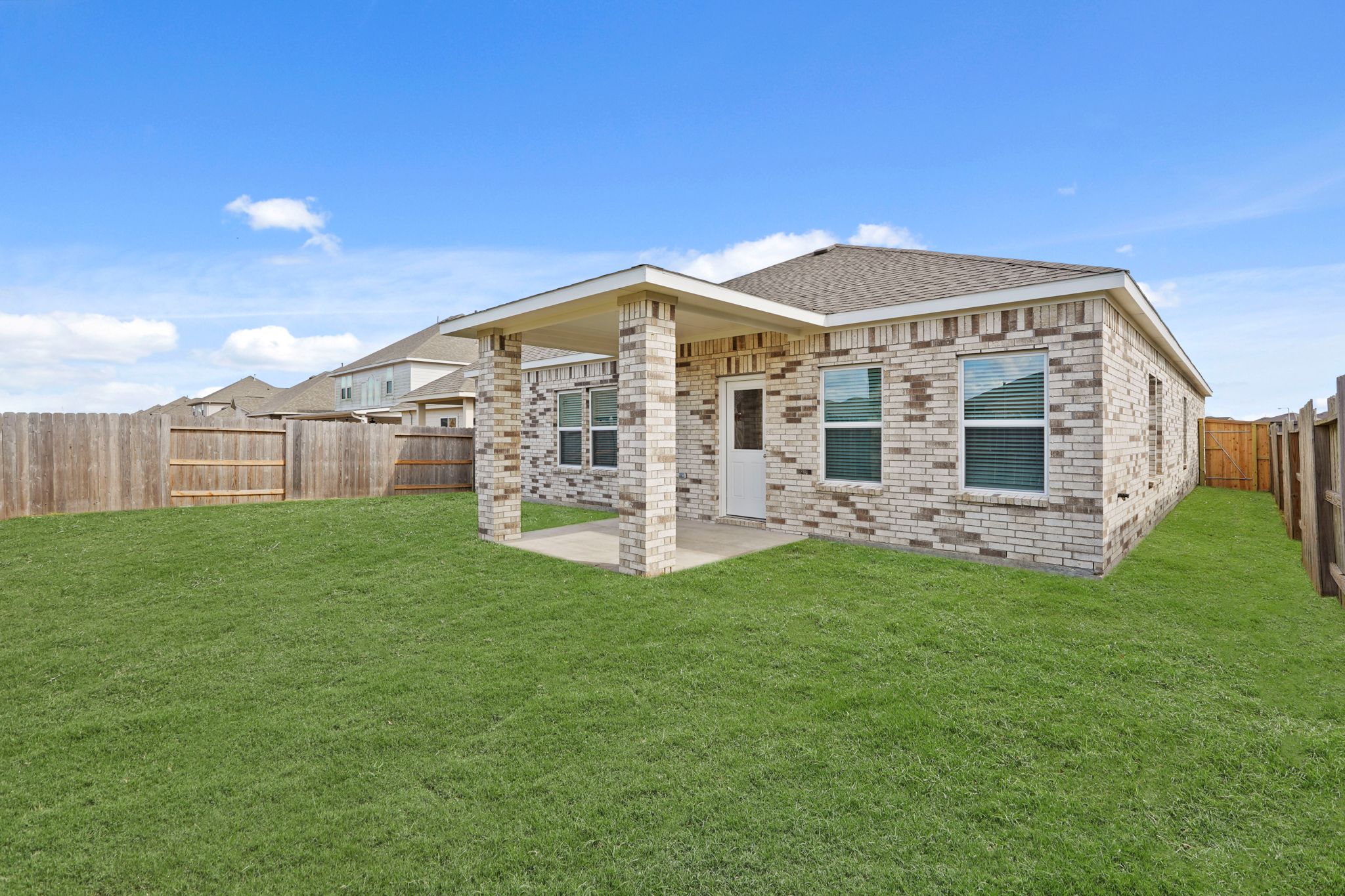 A house with a fence around it.