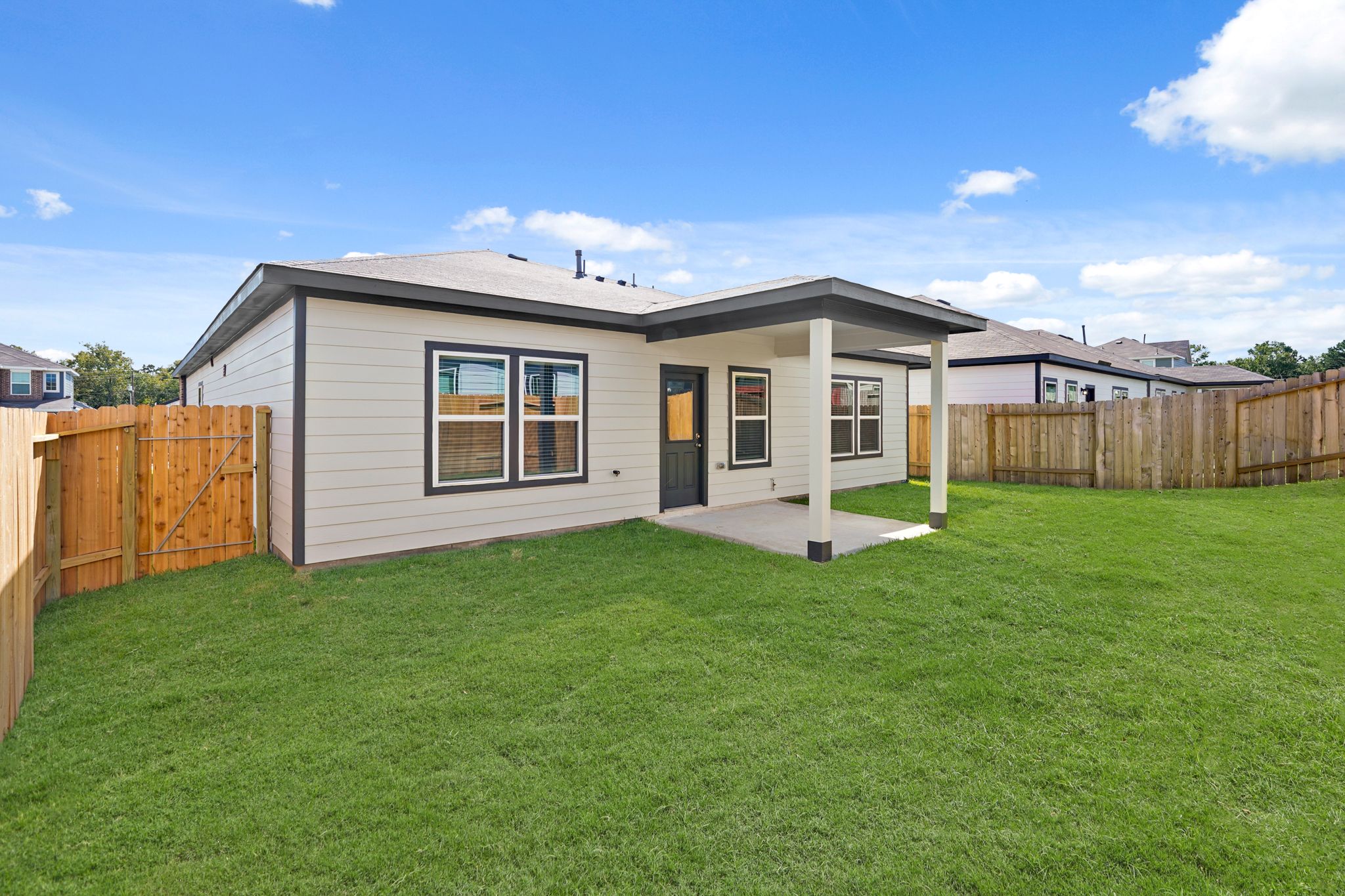A house with a fence around it.