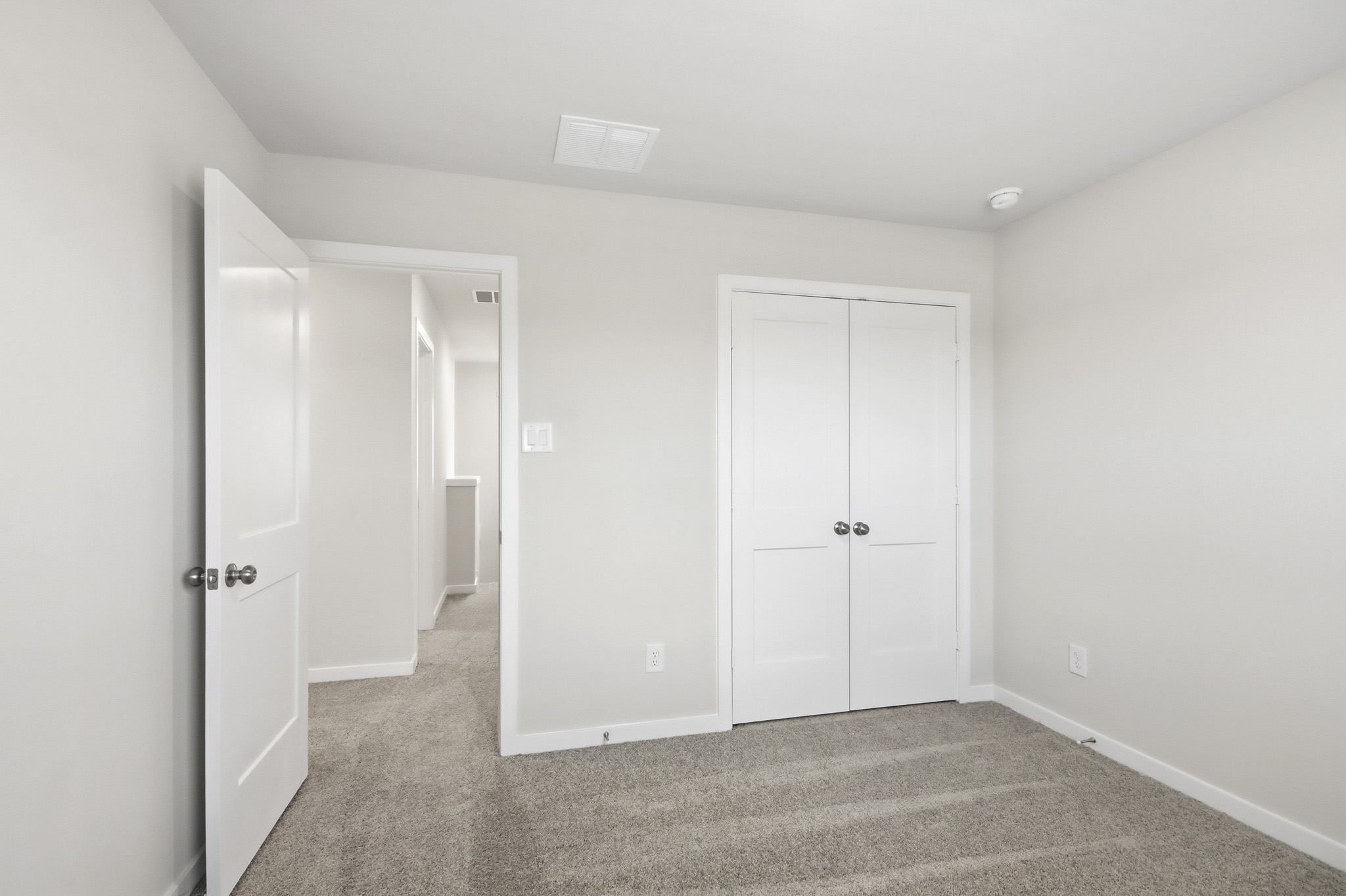 A room with white doors.