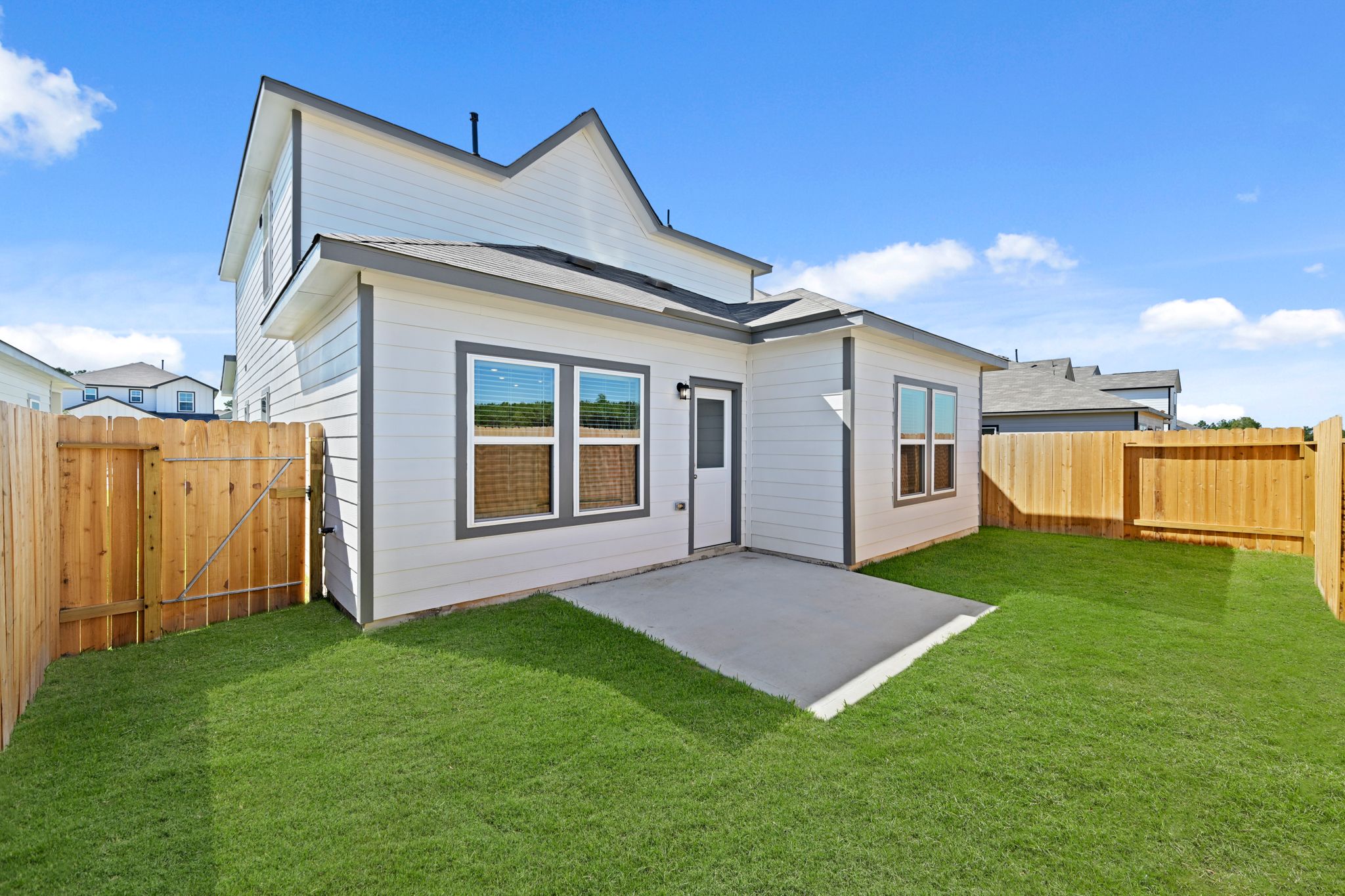 A house with a fence around it.