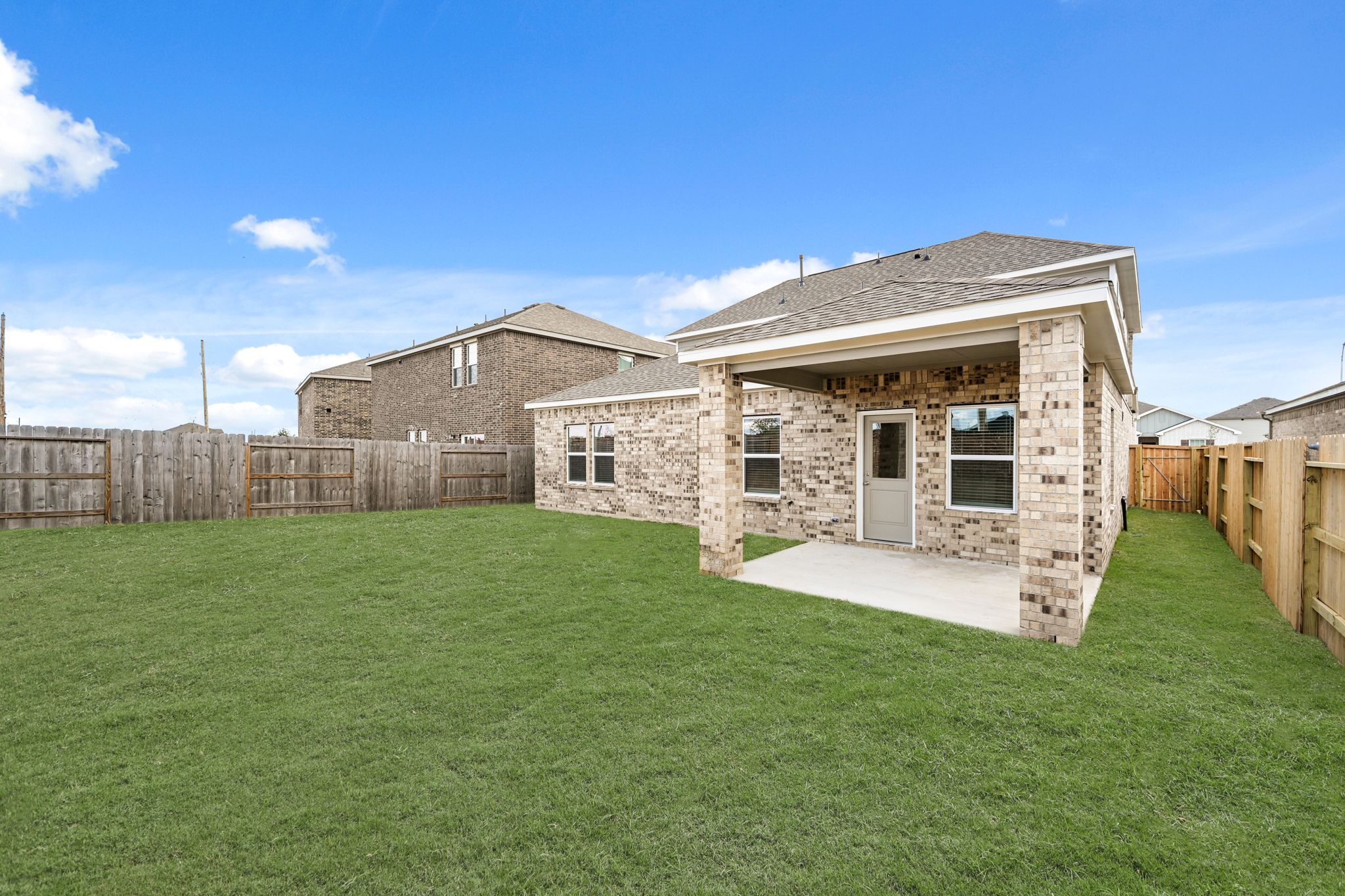 A house with a fence around it.