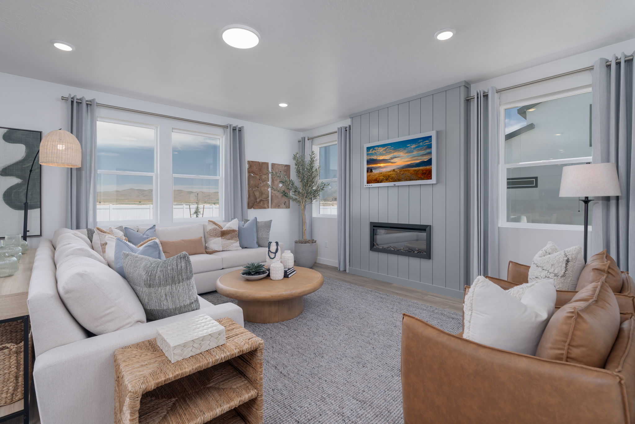 A living room with a fireplace.