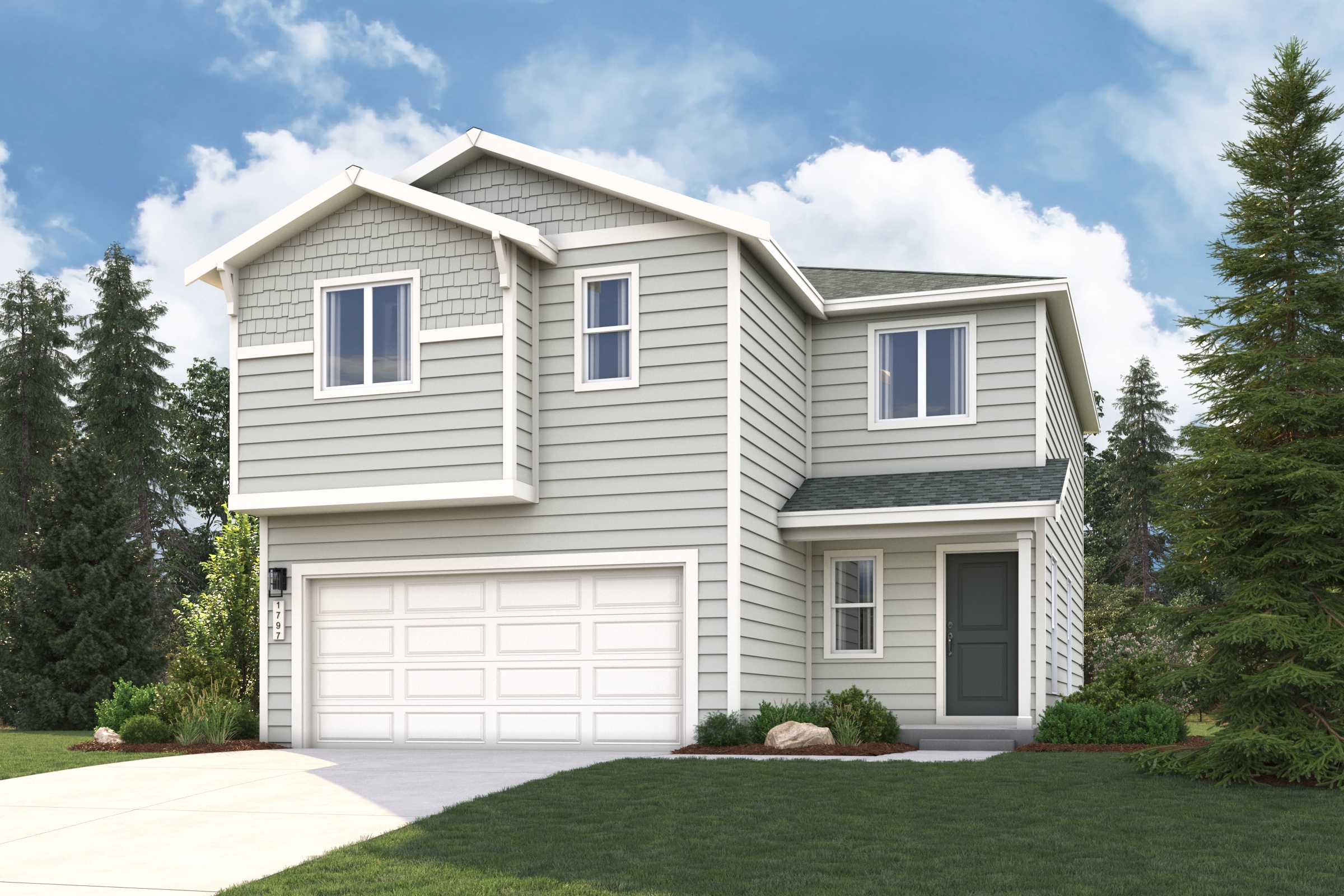 A white house with a garage.