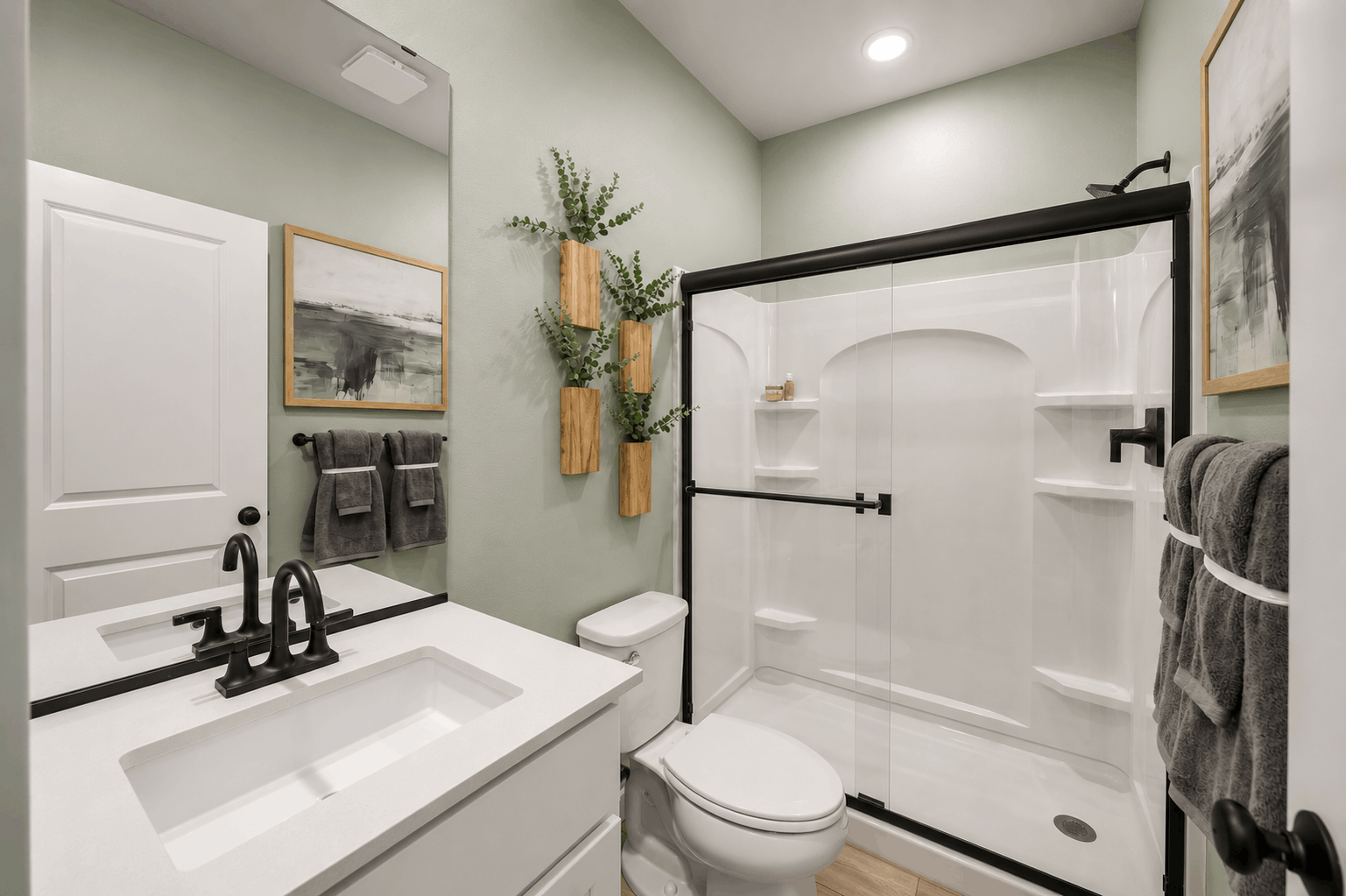 A bathroom with a standup shower.