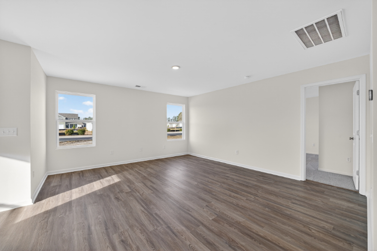 A room with a wood floor and a wood floor.