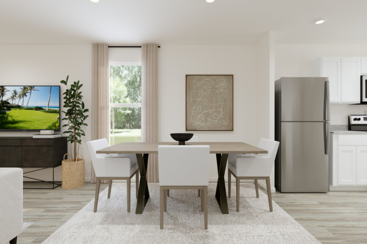 A room with a table and chairs.