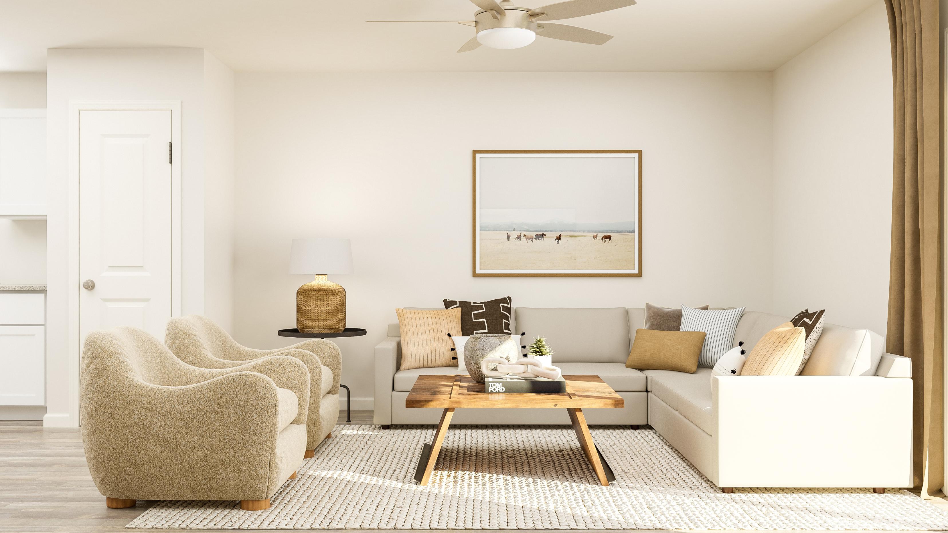 A living room with a couch and a table.