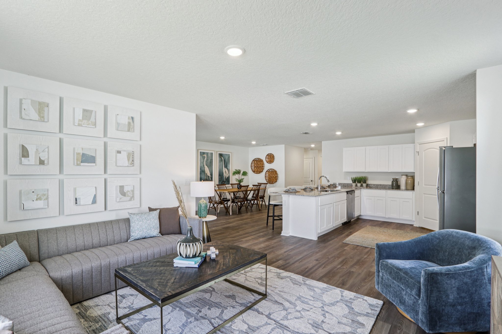 A living room with a couch and a table.