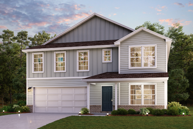 A house with a lawn in front of it.