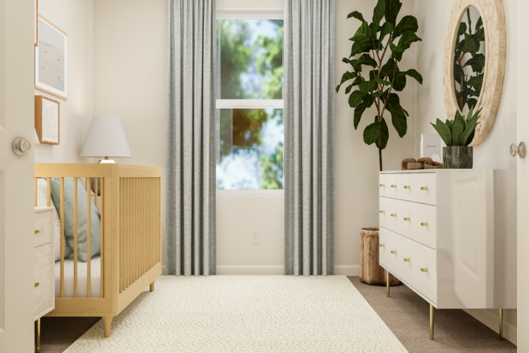 A room with a white rug and a white dresser with a mirror.